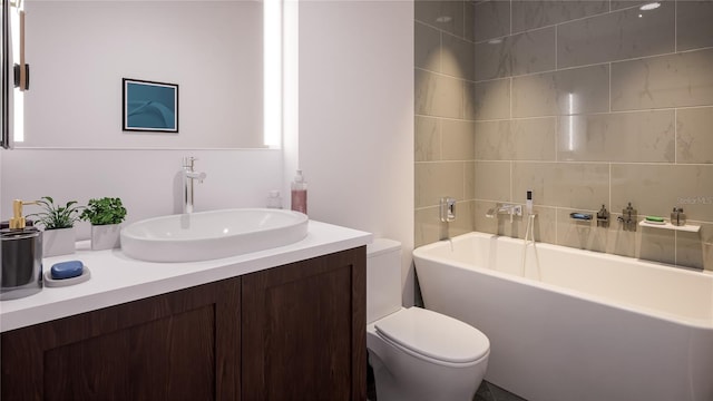 bathroom featuring a bathtub, vanity, and toilet