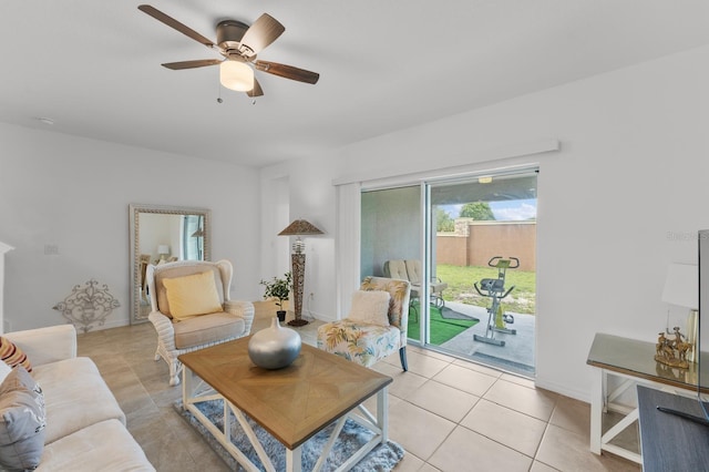 living room featuring ceiling fan and light tile patterned floors