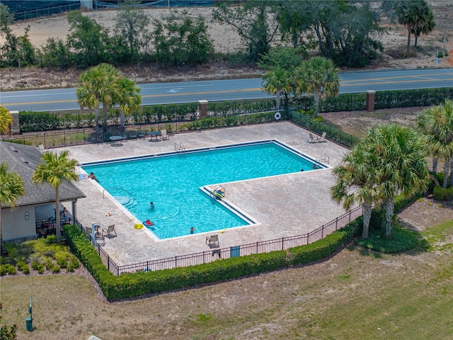 view of swimming pool with a patio area