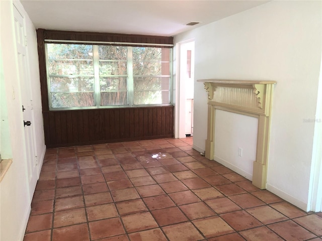 interior space with dark tile patterned floors