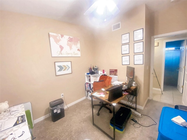 office featuring light carpet and ceiling fan