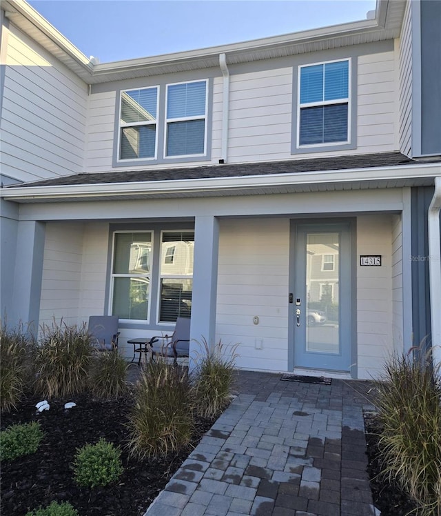 entrance to property with a porch