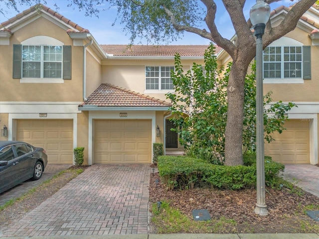 view of front of property featuring a garage