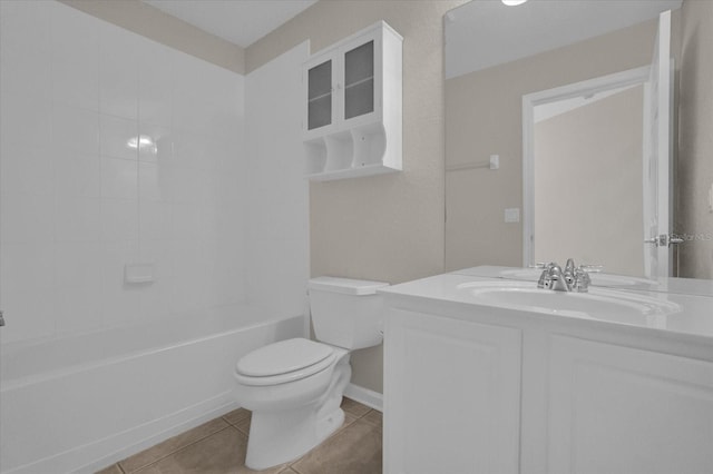 full bathroom with shower / washtub combination, tile patterned flooring, vanity, and toilet