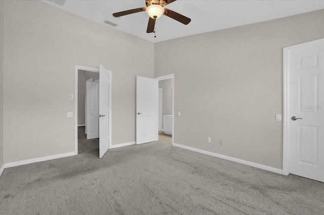 unfurnished bedroom featuring ceiling fan and light colored carpet