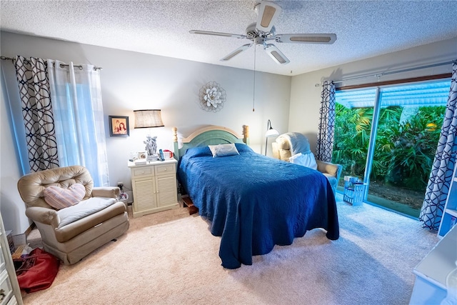 bedroom with ceiling fan, light colored carpet, access to outside, and a textured ceiling