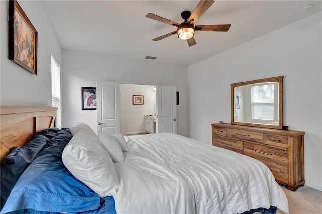 carpeted bedroom with ceiling fan