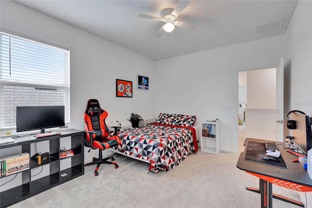 carpeted bedroom featuring ceiling fan