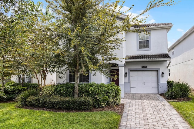 view of front of home with a garage