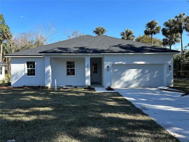 ranch-style house featuring a garage and a front yard