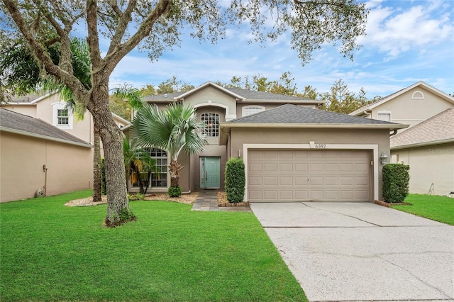 view of front facade featuring a garage and a front lawn