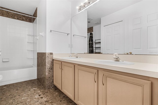 bathroom with vanity and shower / tub combo with curtain