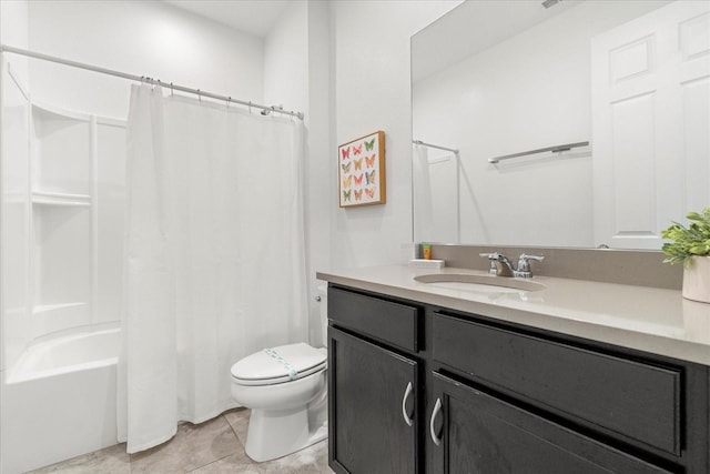 full bathroom featuring vanity, shower / tub combo with curtain, toilet, and tile patterned floors