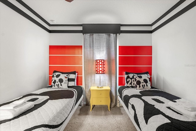 bedroom featuring crown molding and carpet floors