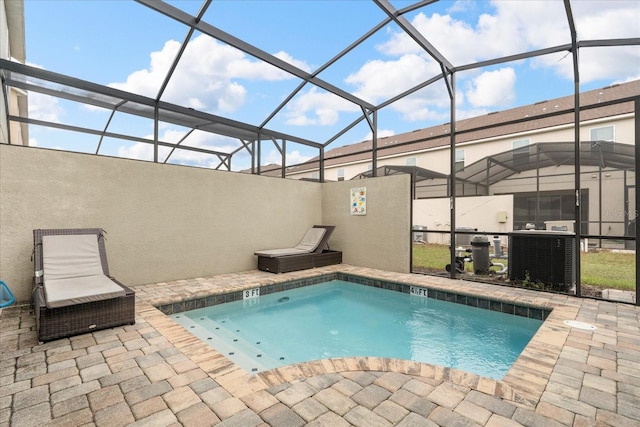 view of pool featuring a patio and a lanai