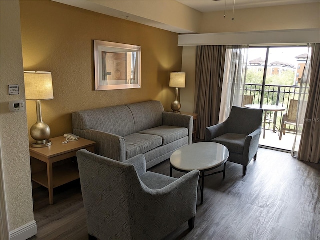 12527 Floridays Resort Dr Unit 510E, Orlando, FL 32821 - living room featuring hardwood / wood-style floors