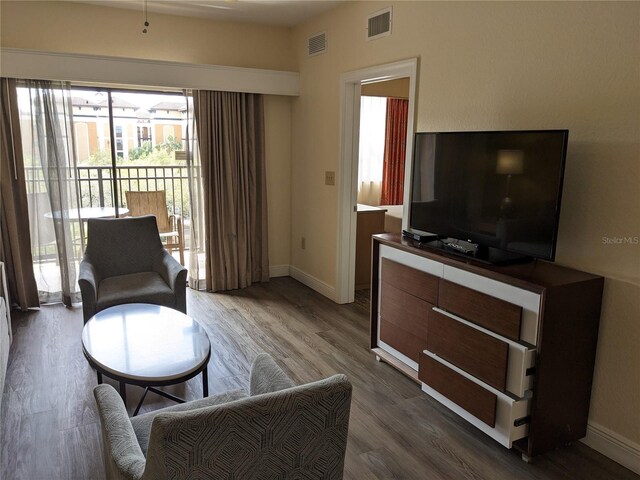 12527 Floridays Resort Dr Unit 510E, Orlando, FL 32821 - living room with hardwood / wood-style floors