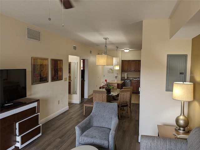 12527 Floridays Resort Dr Unit 510E, Orlando, FL 32821 - living room featuring dark hardwood / wood-style flooring, ceiling fan, and electric panel