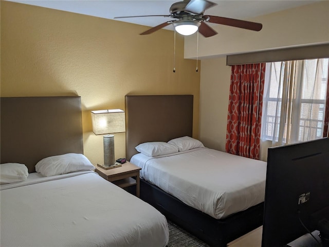 12527 Floridays Resort Dr Unit 510E, Orlando, FL 32821 - bedroom with ceiling fan