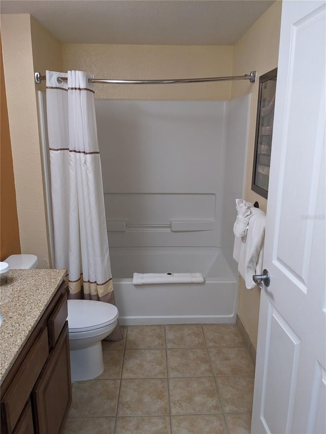 12527 Floridays Resort Dr Unit 510E, Orlando, FL 32821 - full bathroom with vanity, shower / tub combo, toilet, and tile patterned flooring