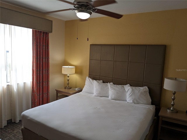 12527 Floridays Resort Dr Unit 510E, Orlando, FL 32821 - bedroom with ceiling fan