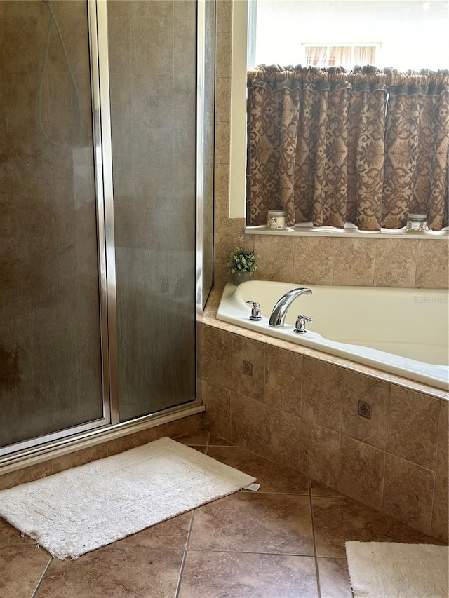 bathroom with plus walk in shower and tile patterned floors