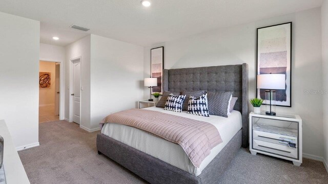 bedroom featuring baseboards, visible vents, recessed lighting, and carpet