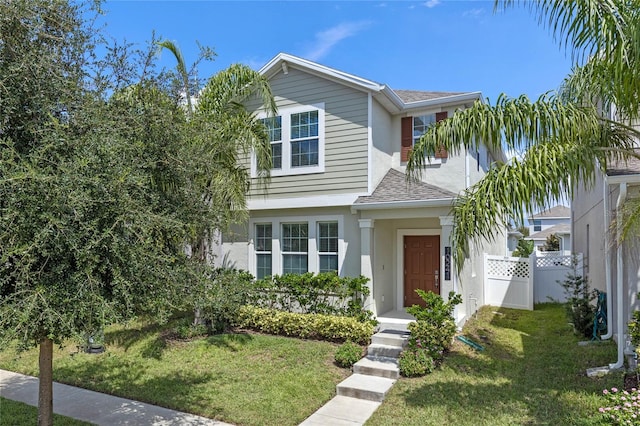 view of front of property featuring a front yard