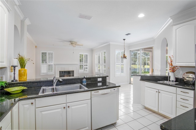 kitchen featuring sink, dishwasher, and crown molding