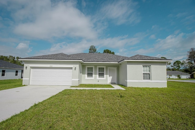 ranch-style home with a garage and a front lawn