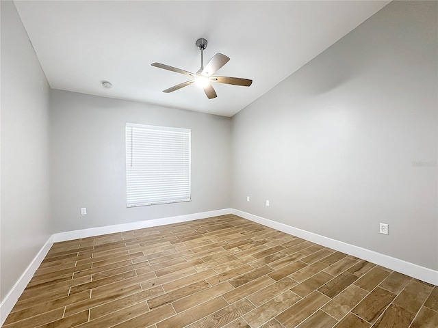 empty room featuring ceiling fan and hardwood / wood-style flooring