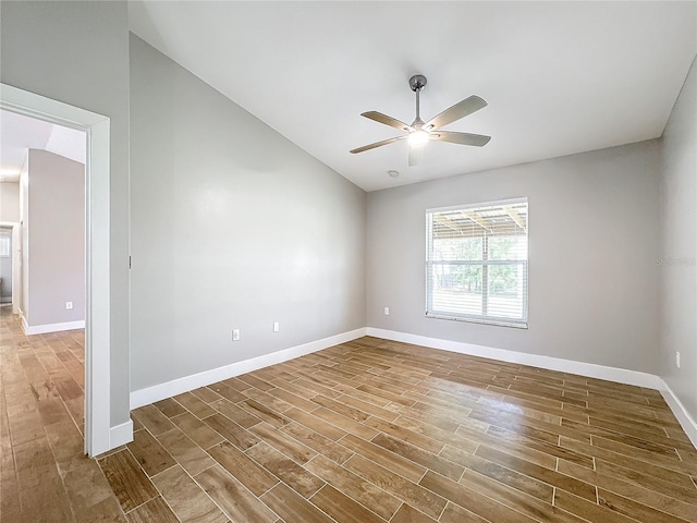 empty room with ceiling fan and wood-type flooring