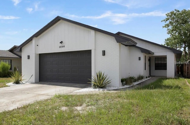 view of side of property with a garage