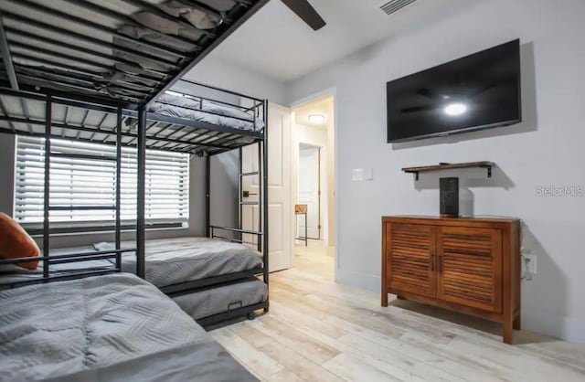 bedroom featuring ceiling fan and light hardwood / wood-style floors