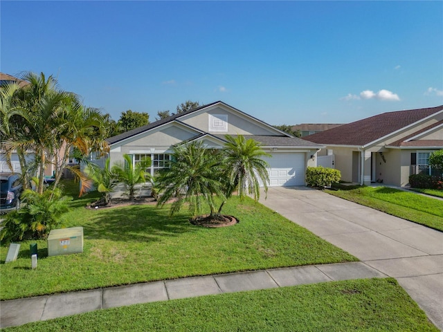 ranch-style house featuring a garage and a front yard