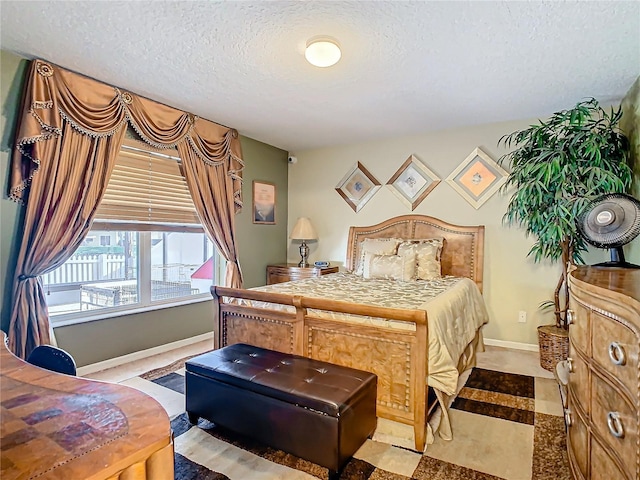 bedroom featuring a textured ceiling