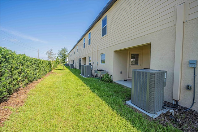 view of yard featuring central AC