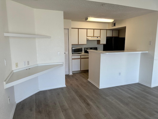 kitchen with black refrigerator, kitchen peninsula, dark hardwood / wood-style flooring, a textured ceiling, and white cabinets