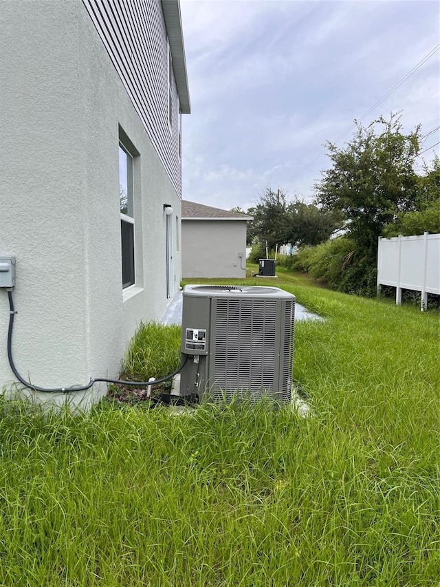 view of yard featuring central AC unit