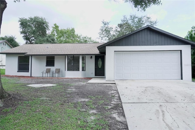 single story home featuring a garage