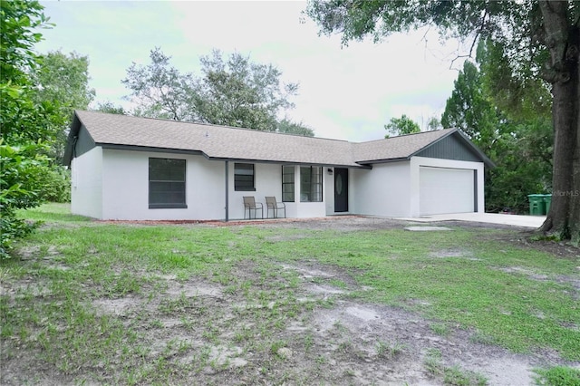 ranch-style home featuring a garage