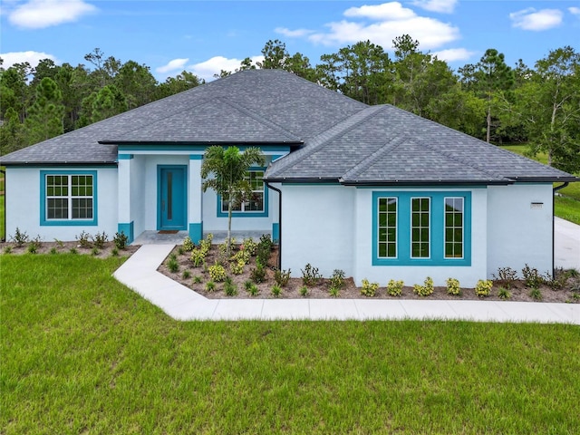 view of front of home with a front lawn