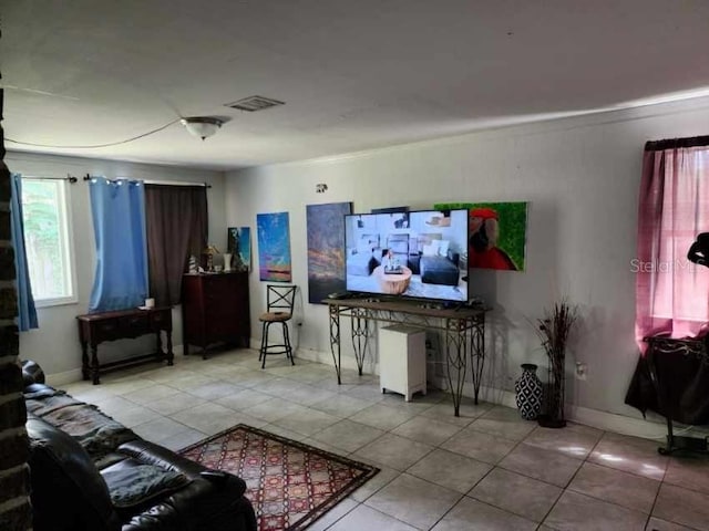 living room featuring tile patterned flooring