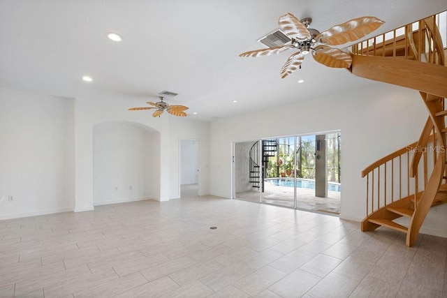 unfurnished living room featuring stairs, ceiling fan, visible vents, and recessed lighting