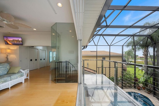 interior space featuring ceiling fan