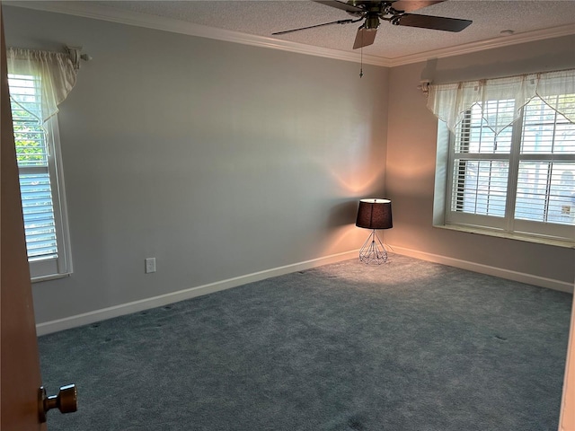 unfurnished room with ornamental molding, a healthy amount of sunlight, a textured ceiling, and carpet flooring