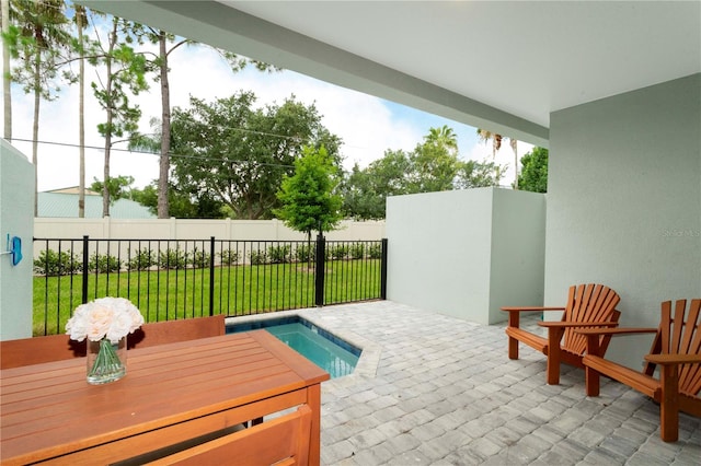 view of patio with a pool