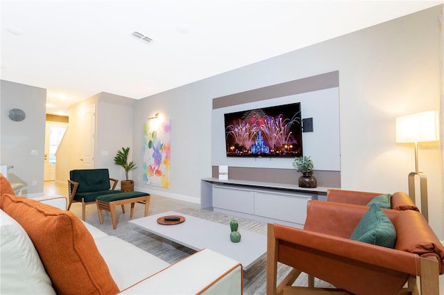 living room featuring a fireplace