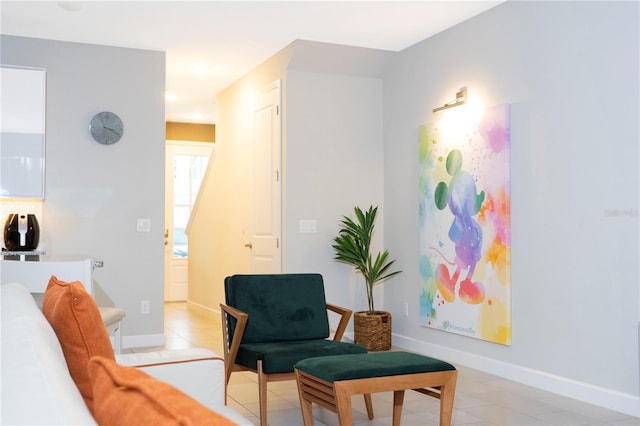 living area with light tile patterned floors