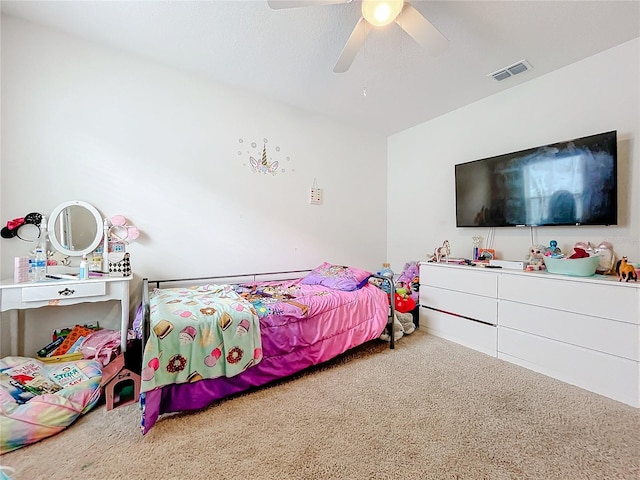 carpeted bedroom with ceiling fan